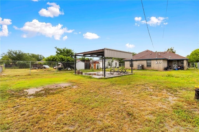1123 E Champion St, Edinburg, TX 78539 - view of yard with central air condition unit
