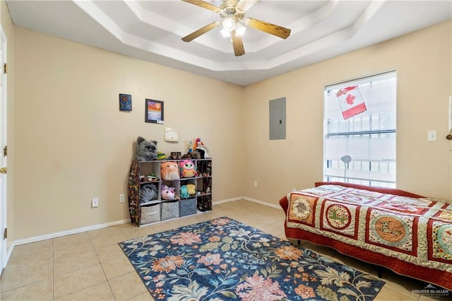 1123 E Champion St, Edinburg, TX 78539 - tiled bedroom featuring a tray ceiling, electric panel, and ceiling fan