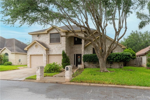 view of front of property with a front lawn and a garage