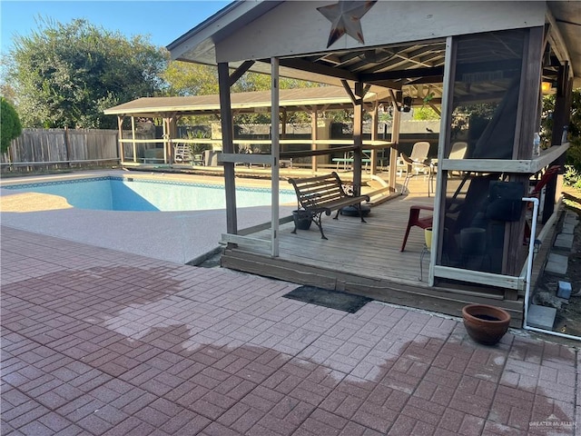 view of pool featuring a gazebo and a deck