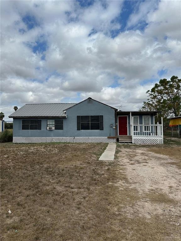 2802 Silverado Cir N, Mission, TX 78574 - view of front of house with metal roof
