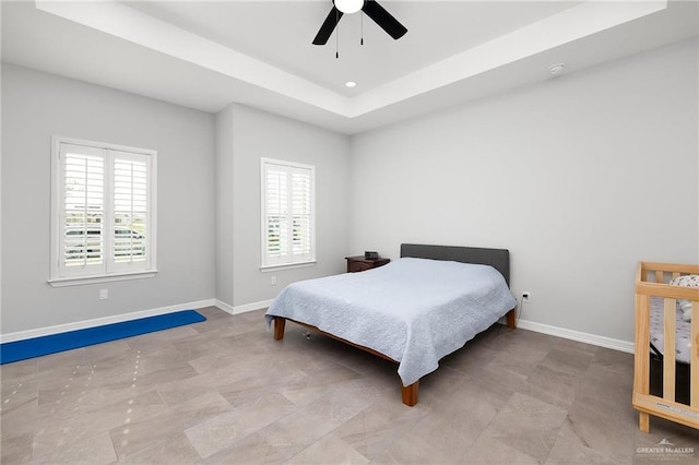 2413 S Cartier Dr, Edinburg, TX 78542 - bedroom featuring a raised ceiling and a ceiling fan