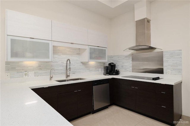kitchen with black electric stovetop, wall chimney range hood, modern cabinets, dishwasher, and a sink