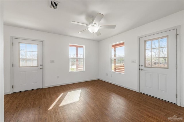 foyer with dark wood-type flooring and ceiling fan