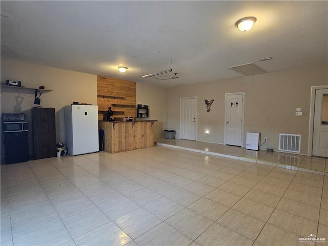 407 E Esperanza Ave, Mission, TX 78574 - unfurnished living room with light tile patterned floors