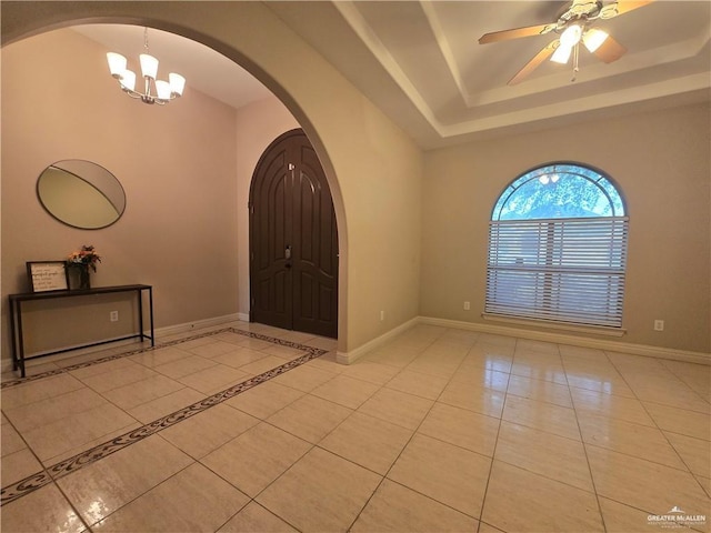 407 E Esperanza Ave, Mission, TX 78574 - foyer entrance with arched walkways, light tile patterned flooring, a chandelier, a tray ceiling, and ceiling fan