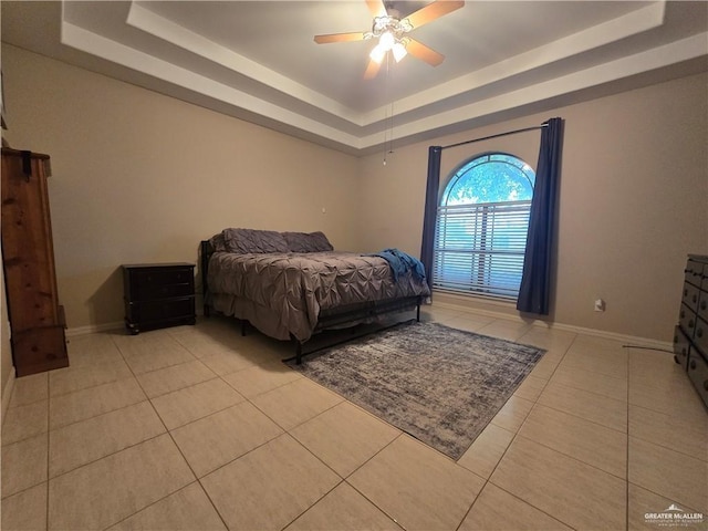 407 E Esperanza Ave, Mission, TX 78574 - bedroom with a tray ceiling, light tile patterned floors, and a ceiling fan