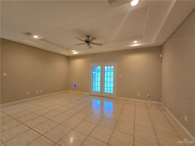 407 E Esperanza Ave, Mission, TX 78574 - spare room featuring a tray ceiling, a ceiling fan, light tile patterned floors, and recessed lighting