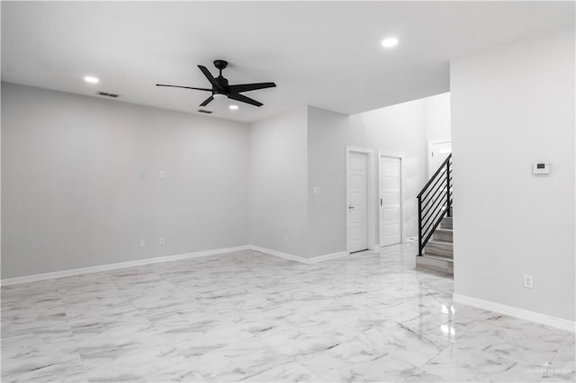 empty room featuring ceiling fan