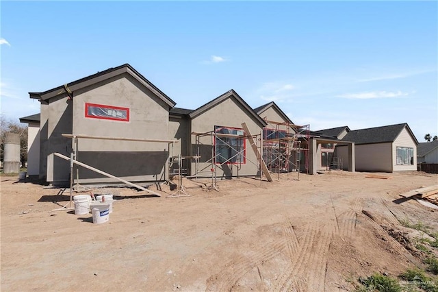 view of front of property featuring stucco siding