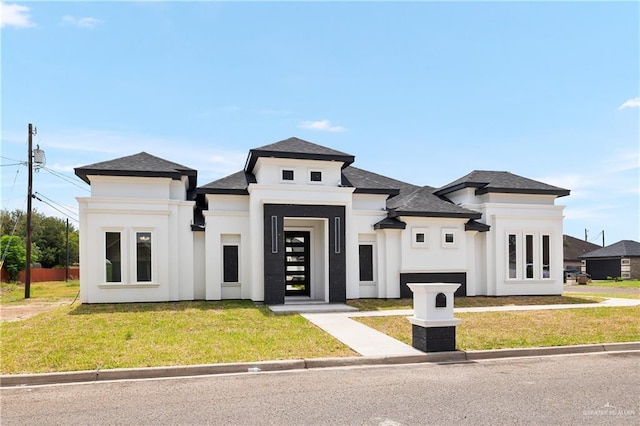 3303 Alcatraz St, Edinburg, TX 78542 - view of front of home featuring a front yard, stucco siding, and a shingled roof