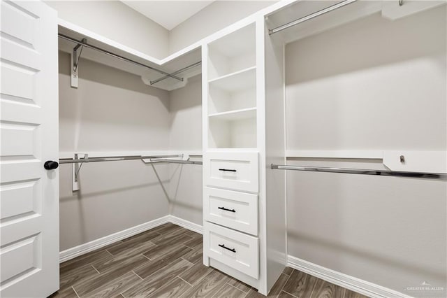 3303 Alcatraz St, Edinburg, TX 78542 - spacious closet featuring dark wood-style flooring