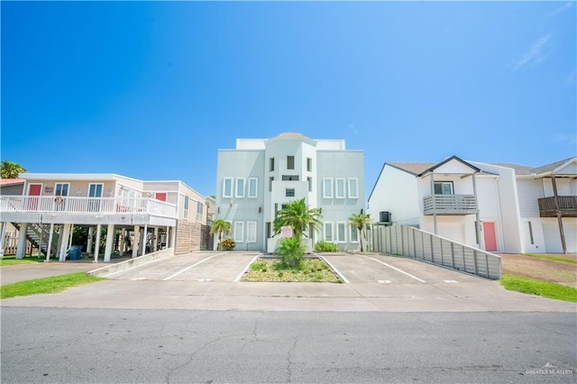 112 E Acapulco St E Unit 3, South Padre Island, TX 78597 - view of property featuring uncovered parking