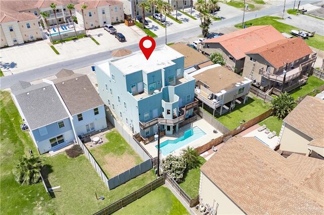 112 E Acapulco St E Unit 3, South Padre Island, TX 78597 - aerial perspective of suburban area featuring a pool area