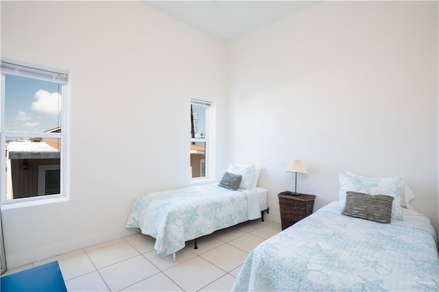 112 E Acapulco St E Unit 3, South Padre Island, TX 78597 - bedroom with tile patterned flooring
