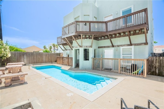 112 E Acapulco St E Unit 3, South Padre Island, TX 78597 - view of swimming pool with a patio and a fenced backyard