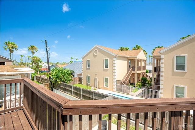 112 E Acapulco St E Unit 3, South Padre Island, TX 78597 - wooden deck featuring a residential view