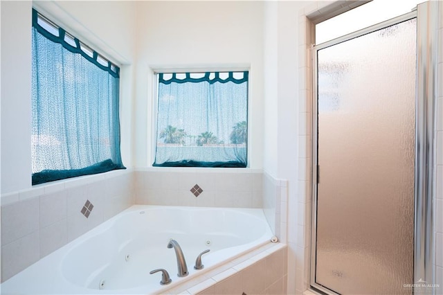 112 E Acapulco St E Unit 3, South Padre Island, TX 78597 - bathroom featuring a stall shower and a tub with jets