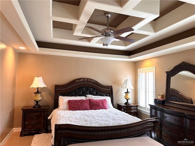 tiled bedroom with ceiling fan and coffered ceiling