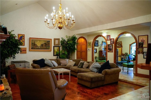 living room featuring arched walkways, vaulted ceiling, and a chandelier