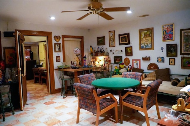 game room featuring a ceiling fan, light flooring, and recessed lighting