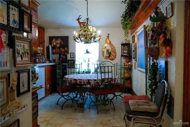 dining room featuring a chandelier