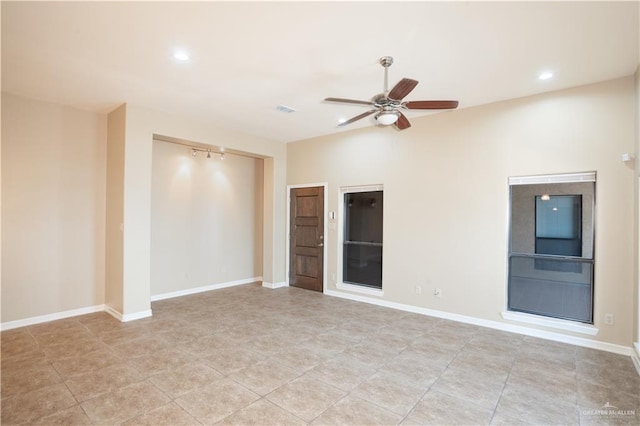 2815 Mimosa St Unit 6, Mission, TX 78574 - spare room with a ceiling fan and recessed lighting