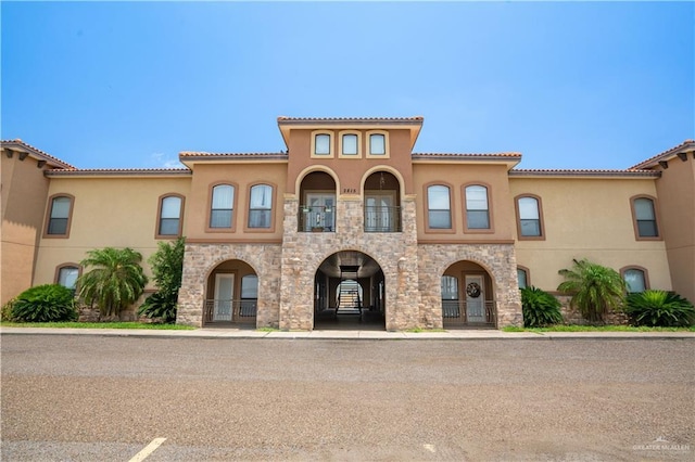 2815 Mimosa St Unit 6, Mission, TX 78574 - mediterranean / spanish house with stucco siding and stone siding