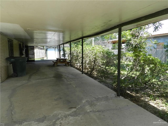 view of patio / terrace featuring a carport