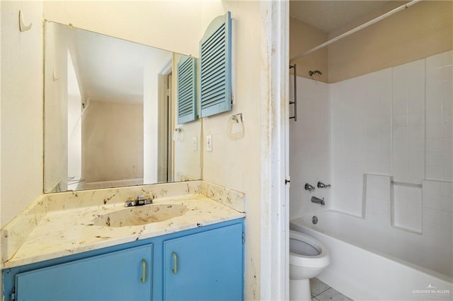 full bathroom with tile patterned flooring, vanity, tub / shower combination, and toilet