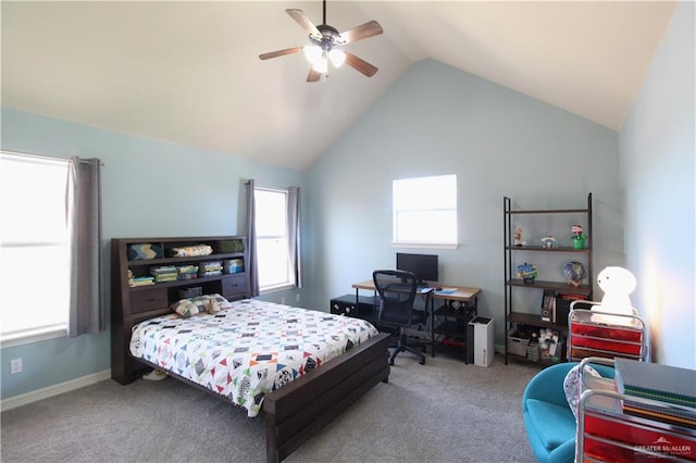 carpeted bedroom with vaulted ceiling and ceiling fan