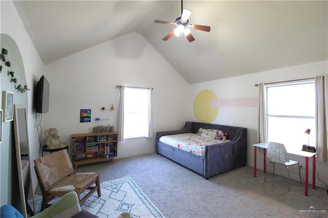 carpeted bedroom featuring vaulted ceiling and ceiling fan