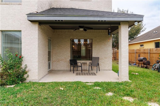 view of patio / terrace featuring ceiling fan, fence, and area for grilling