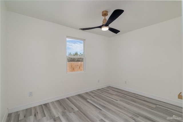 unfurnished room with ceiling fan and light hardwood / wood-style flooring