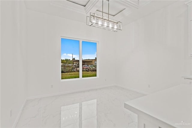 unfurnished dining area with marble finish floor, baseboards, and a chandelier