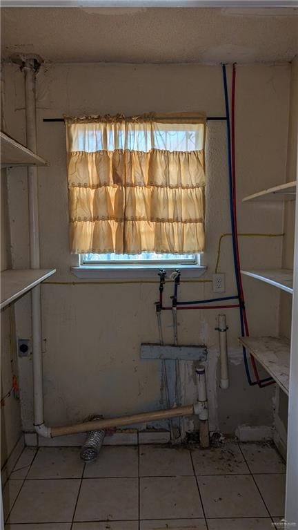 608 Santa Angela St, Pharr, TX 78577 - basement featuring light tile patterned floors