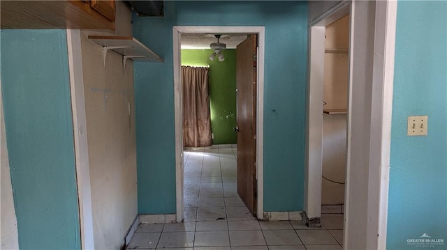 hallway with light tile patterned floors