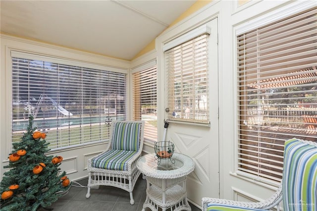 sunroom / solarium with vaulted ceiling