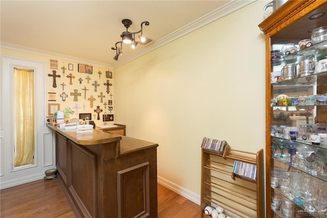 office space with ornamental molding, dark wood-type flooring, and a chandelier