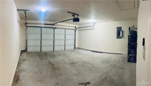 garage featuring a garage door opener and electric panel