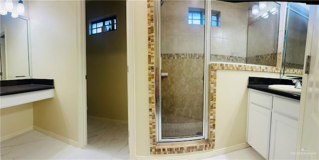 bathroom with vanity and walk in shower