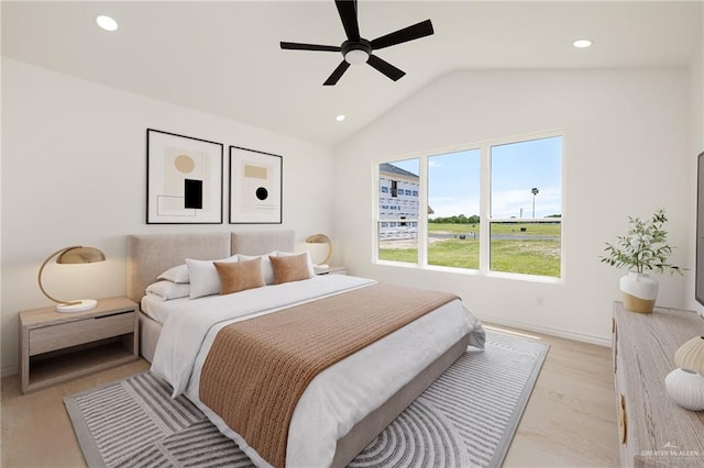 2712 E Burberry Dr, Edinburg, TX 78542 - bedroom with baseboards, ceiling fan, recessed lighting, vaulted ceiling, and light wood-style flooring
