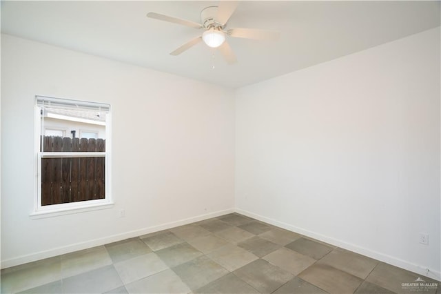 spare room featuring ceiling fan