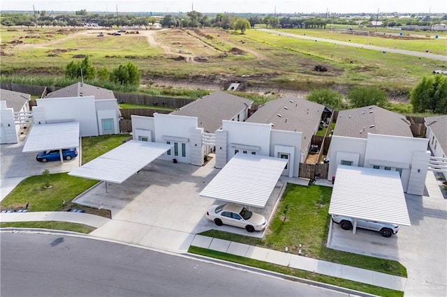 birds eye view of property featuring a rural view