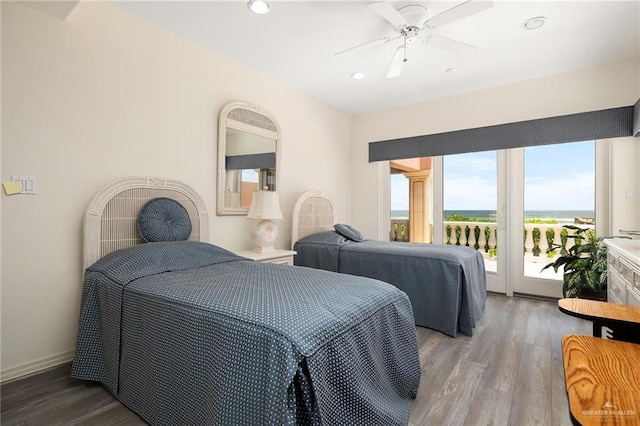 bedroom with access to outside, ceiling fan, and wood-type flooring