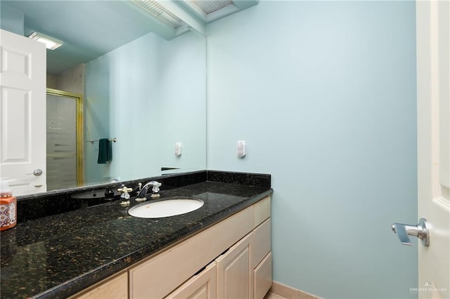 bathroom featuring vanity and walk in shower