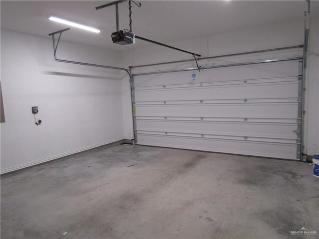 garage featuring a garage door opener