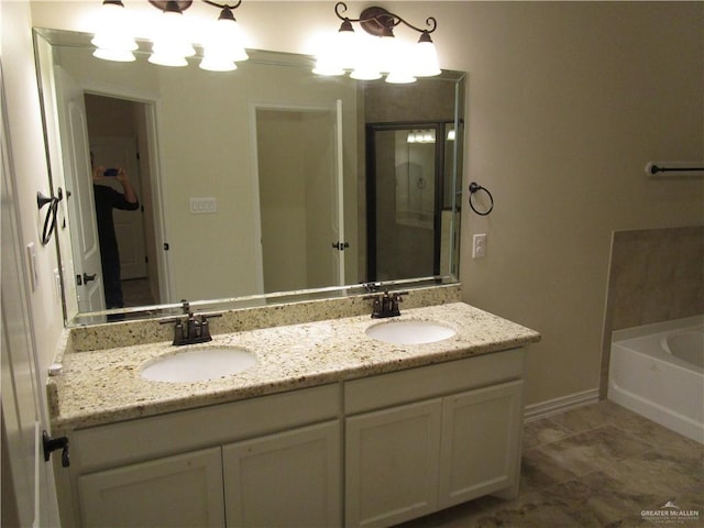 bathroom with vanity and a bathtub