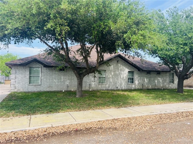 view of property exterior featuring a yard