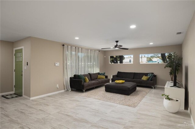 living room with ceiling fan